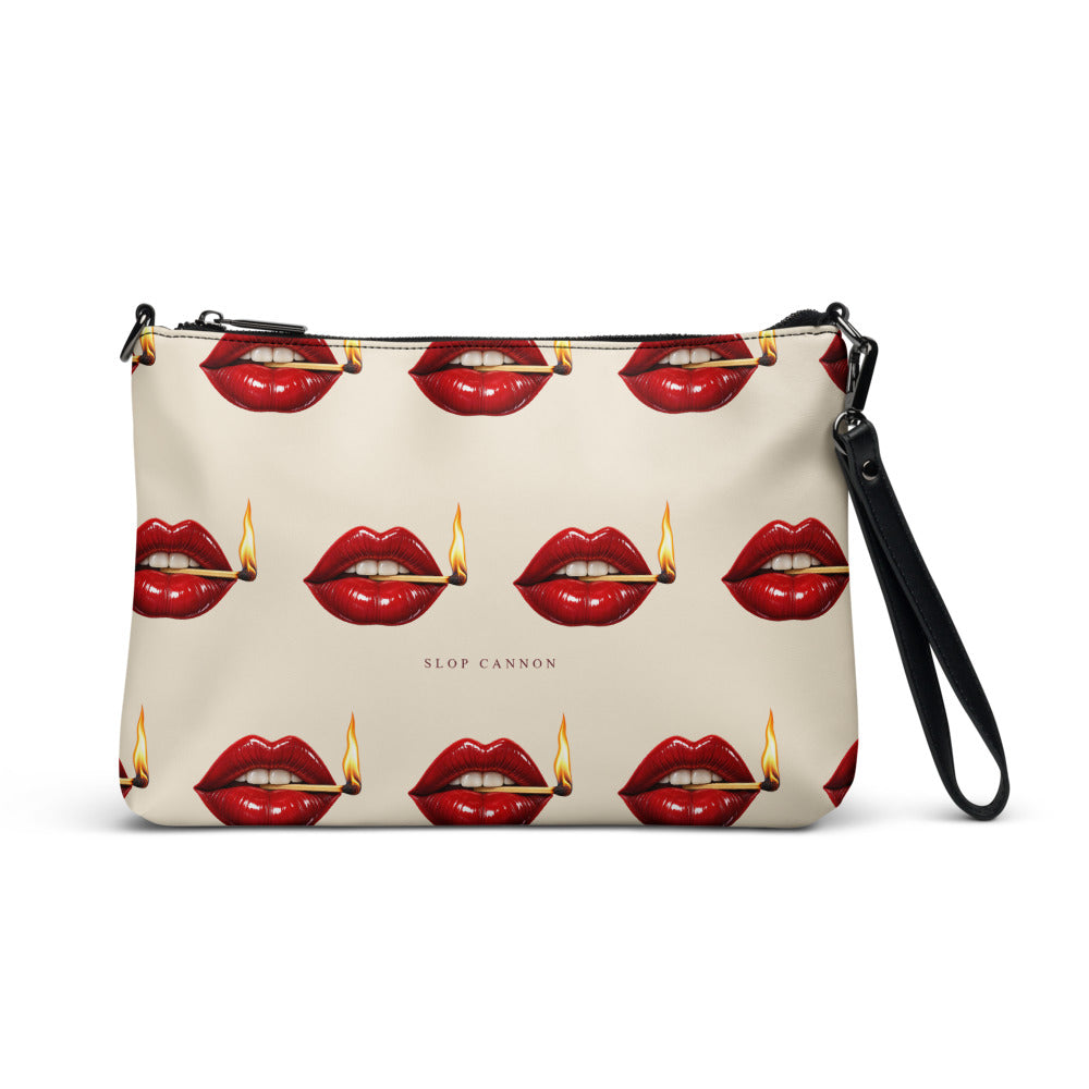 Slop Cannon Play With Fire Crossbody Bag — Cream / black trim — front view; bag only; printed faux leather with black trim; supplier digital mockup.