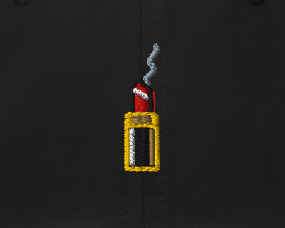 Loaded — Black — embroidery artwork detail cropped from supplier digital preview; simulated thread texture; Yupoong 6245CM Black; supplier digital mockup.