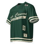 Slop Cannon Social Club — Forest / Cream — three-quarter garment view with printed sleeve and hem stripes; Printful boxy V-neck football jersey White base, printed Forest / Cream; Black stitching; supplier digital mockup.