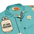 Propane Paradise Beach Button-Up — Turquoise / Cream / Orange — propane lettering and collar print detail; Printful all-over-print unisex button-up shirt White base / all-over print; supplier digital mockup.