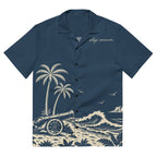 Cannon Coast Beach Button-Up — Navy / Cream — full front with approved reconstructed coastal scene and chest signature; plain sleeves; Printful all-over-print unisex button-up shirt Navy and cream all-over print; supplier digital mockup.