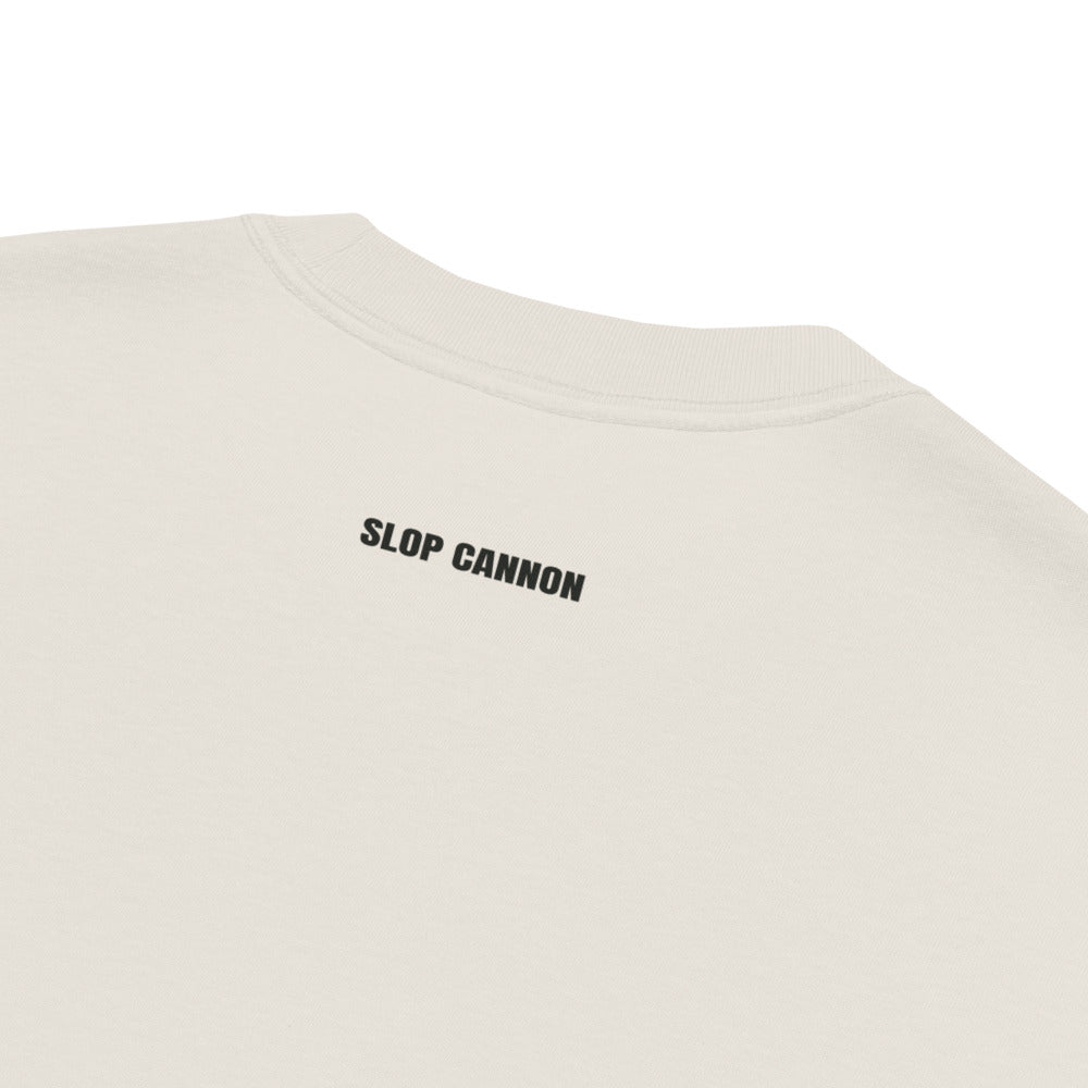 Heavy Block tee — Cream — outside-neckline print detail; AS Colour 5082 Faded Bone; supplier digital mockup.