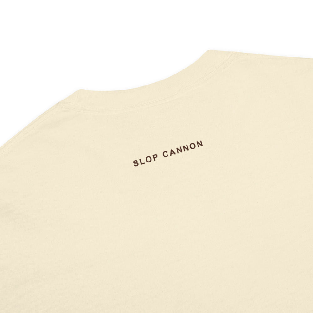 Pig Oval tee — Ivory — small brown SLOP CANNON outside-neckline print detail; Comfort Colors 1717 garment-dyed heavyweight tee Ivory; supplier digital mockup.
