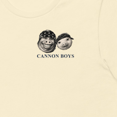 Cannon Boys tee — Natural — left-chest heads and lettering detail cropped from supplier digital mockup; Bella + Canvas 3001 Natural; supplier digital mockup.