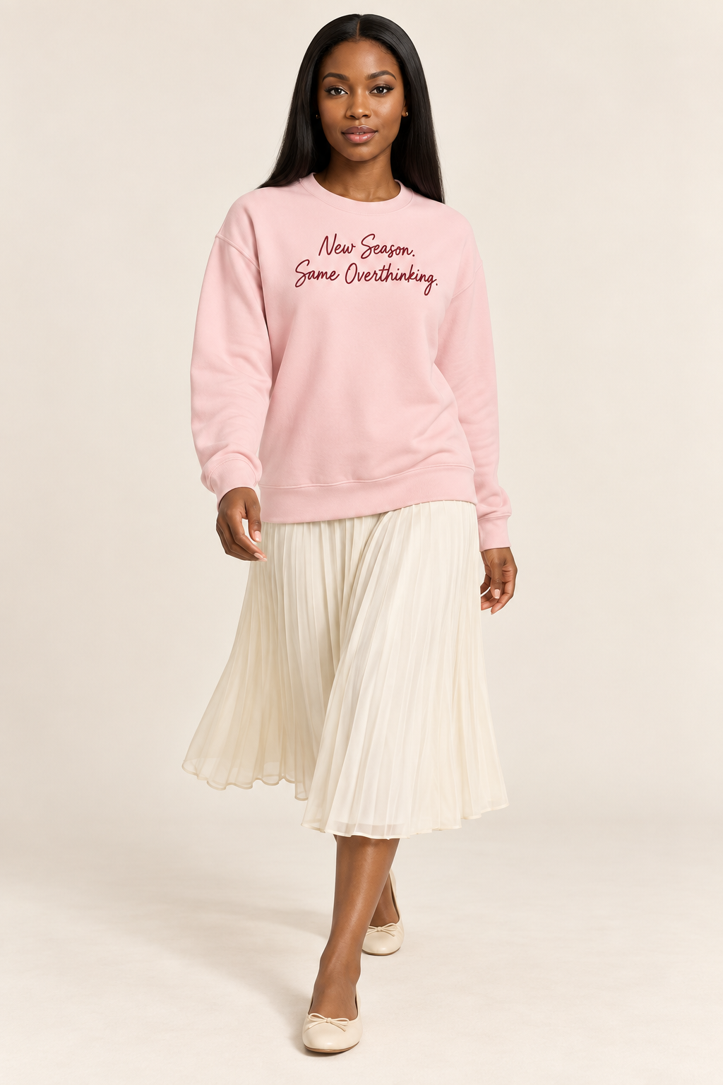 Brielle Ford wearing the Light Pink script sweatshirt, walking view