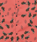 Lil Cannonboy Get In Beach Button-Up — Coral / Black — literal crop of the final dense quarter-size Cannonboy and lettering pattern from the supplier front; no upscaling; supplier digital mockup.