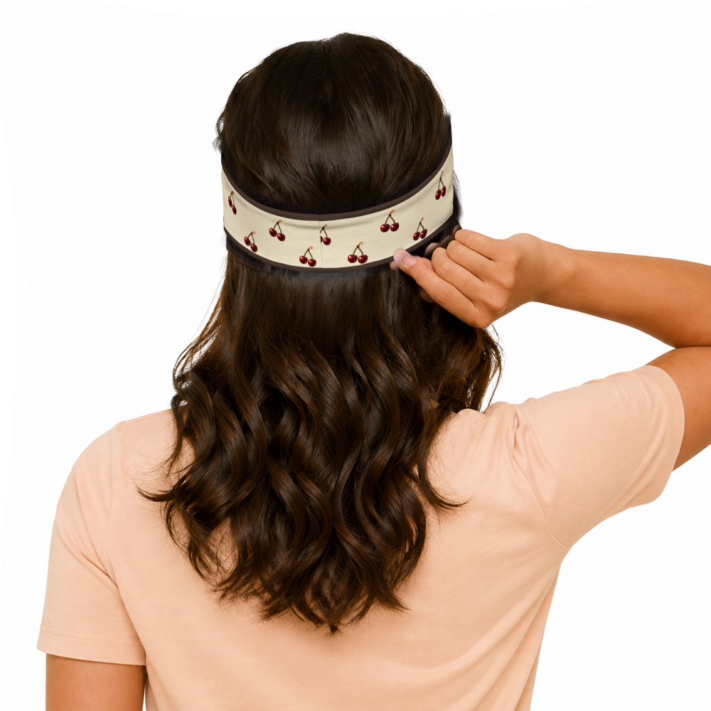 Slop Cannon Cherry Fuse Repeat Headband — Ivory / espresso — model-worn rear view; headband only; clothing excluded; printed straight band with espresso edge stripes; digital model composite with exact supplier headband; not a manufactured-sample photograph.