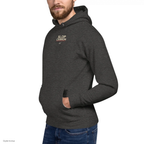 MAGAtard Cannonball Hoodie — Charcoal — three-quarter model view; hoodie only; Cotton Heritage M2580 pullover hoodie Charcoal Heather; digital model composite using the exact supplier garment preview; not a manufactured sample.
