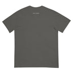 Smoke Signal tee — Charcoal — full back with cream outside-neckline wordmark and otherwise plain back; Comfort Colors 1717 Pepper; supplier digital mockup.