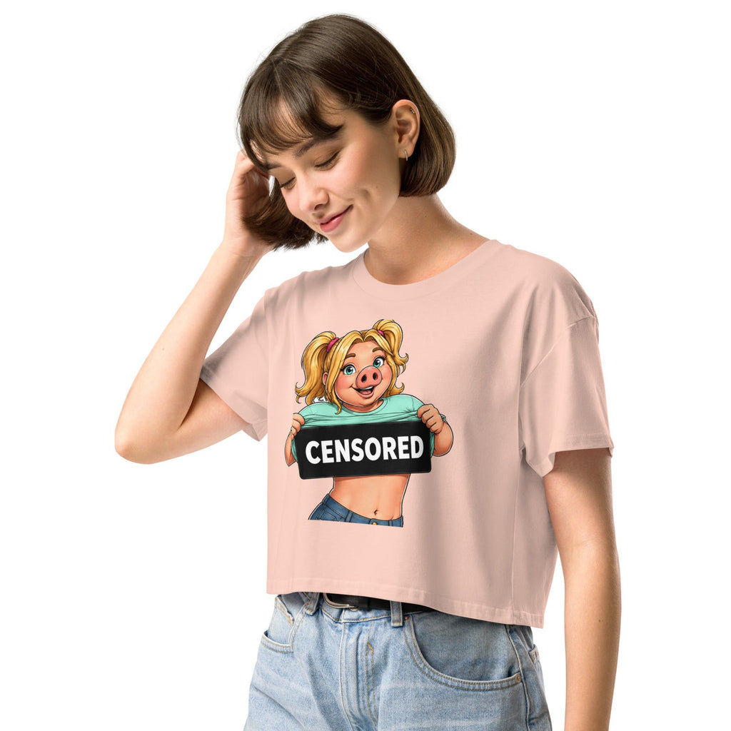Wigette Censored Cropped Tee — Pale Pink — adult woman wearing the actual crop tee left front view; exact Printful digital mockup, tee only.