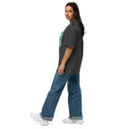 Wigette Censored Colorblock Oversized Tee — Faded Black — adult woman wearing the actual oversized tee left view; exact Printful digital mockup, tee only.